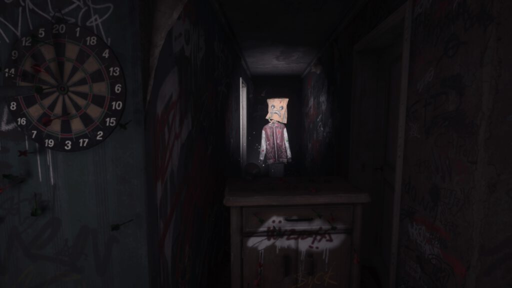Silent Hill The Short message. Gruselige Puppe wird von ANite angeleuchtet.